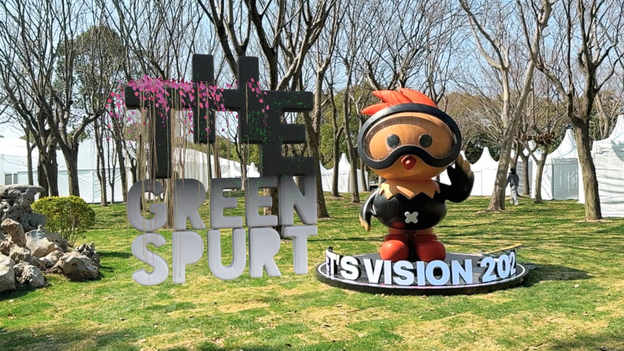 The Green Spurt and Let's Vision 2logos side by side